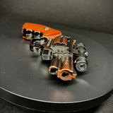SMALL LASER ORANGE HANDGUN